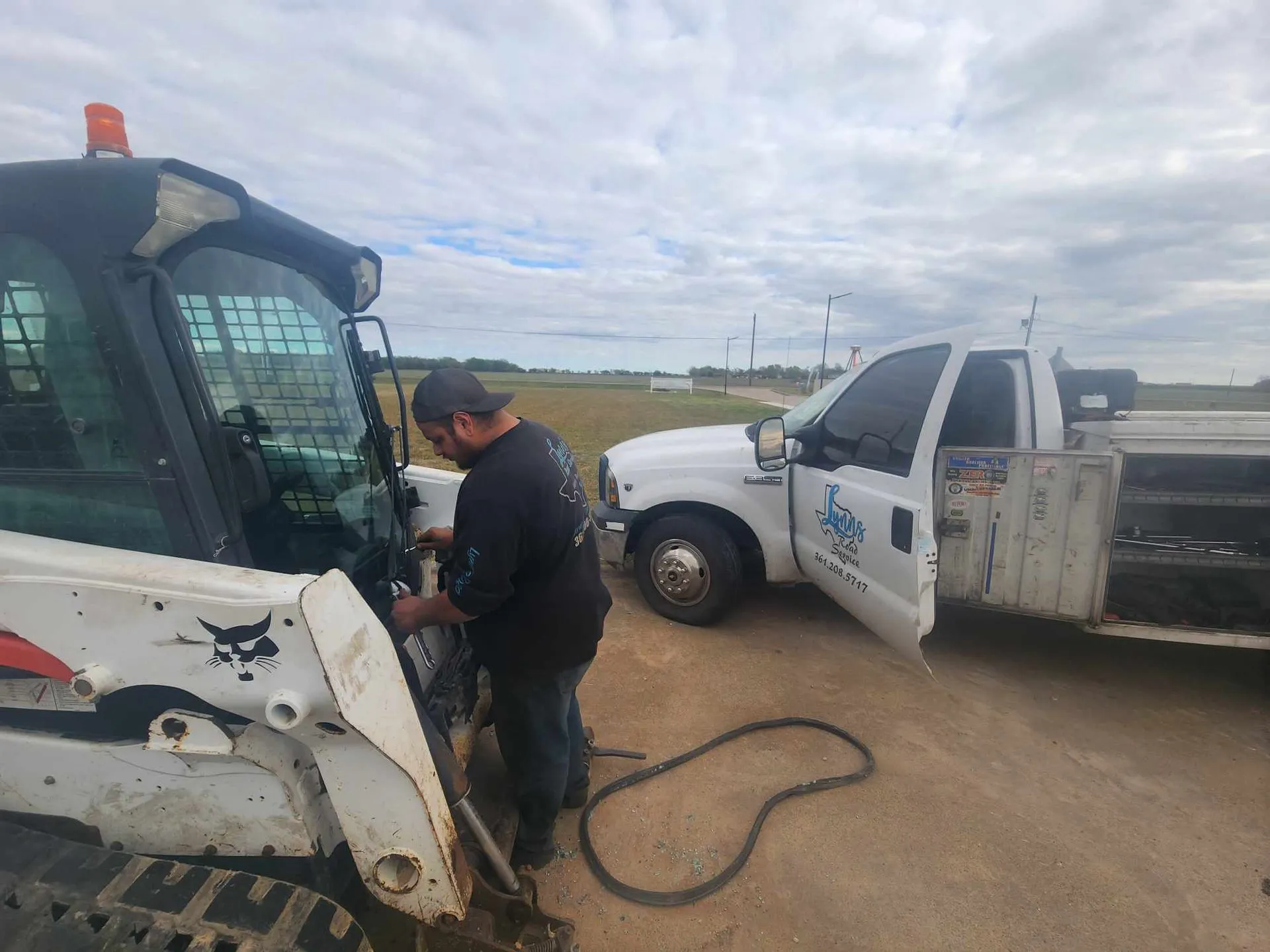 Man works on a Bobcat
